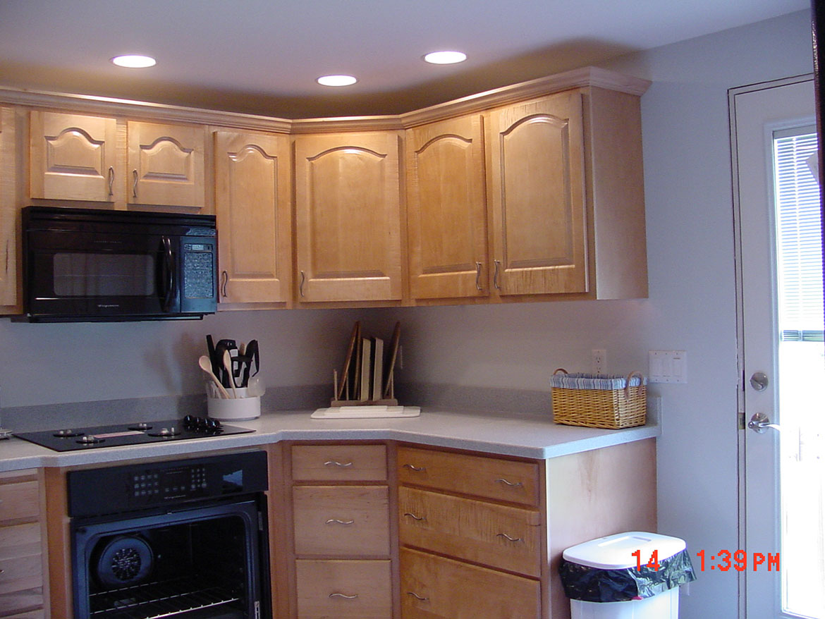 Custom kitchen cabinetry with finished hardware